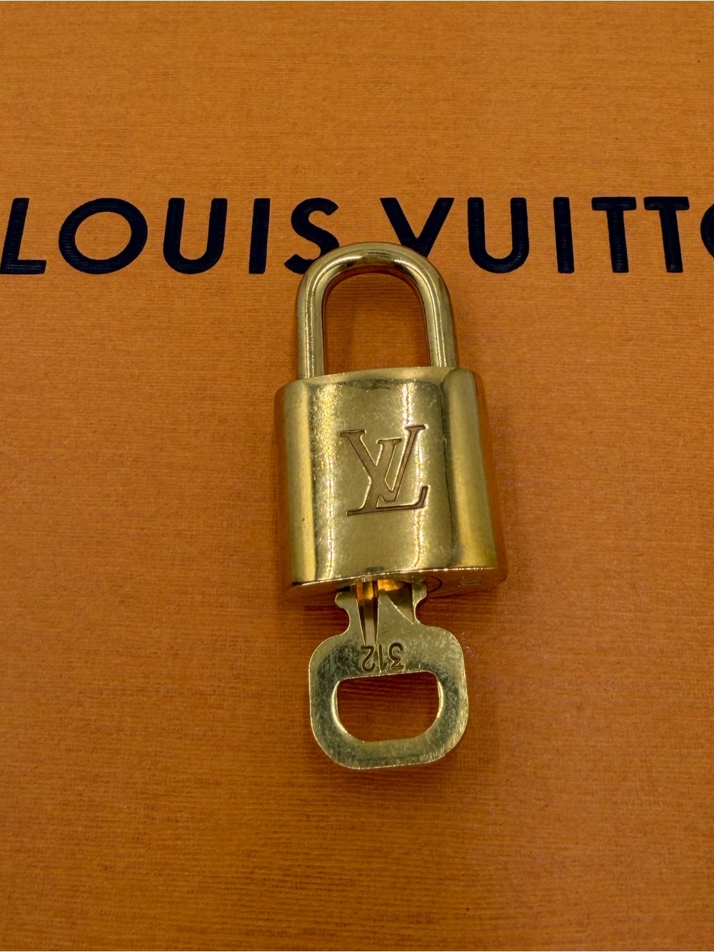Louis Vuitton Authentic Gold Padlock and Key Set #312